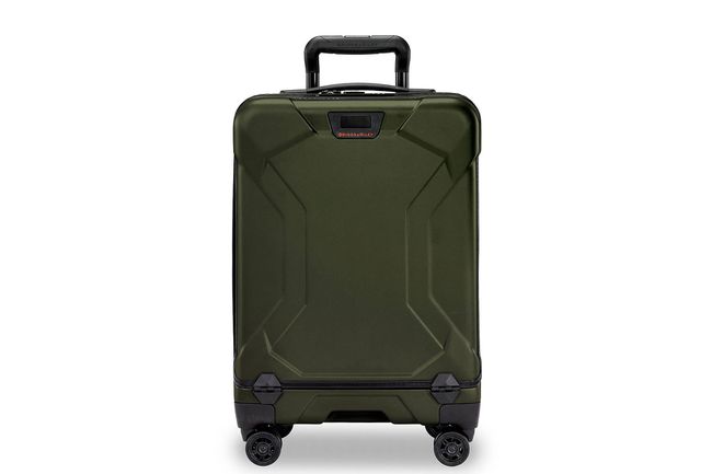 Зеленый жесткий ручной чемодан