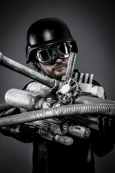Звездный истребитель с огромной плазменной винтовкой, фантастический концепт, военный шлем и очки мотоциклиста. airsoft